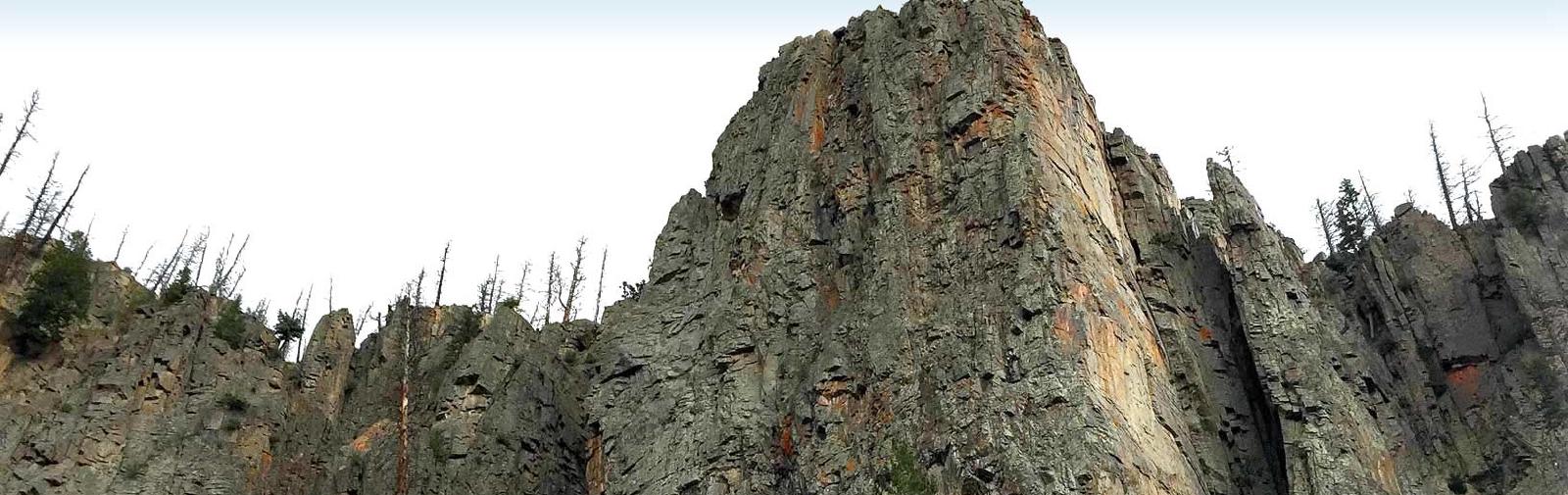 Majestic rocky cliffs waiting to for someone to climb them.